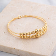 2 Line Kid's Beads Cuff Bracelet (D87) on travertine