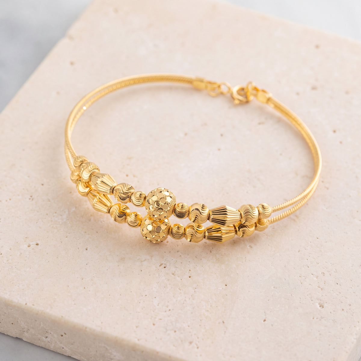 2 Line Kid's Beads Cuff Bracelet (D88) on travertine