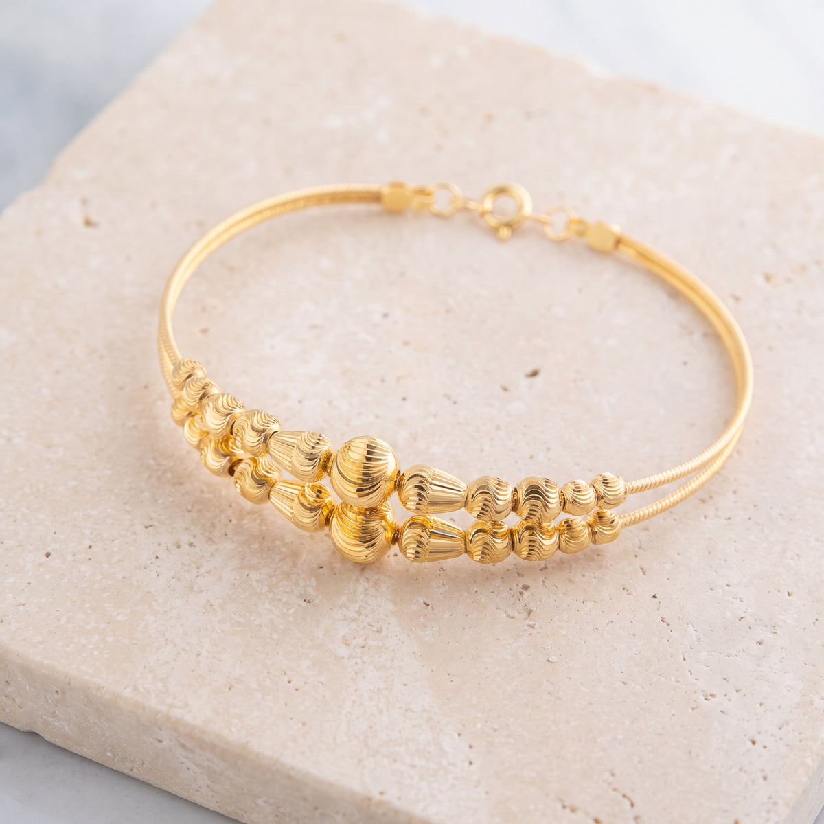 2 Line Kid's Beads Cuff Bracelet (D95) on travertine