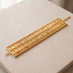 2 Line Patta Bracelet (D2) on travertine