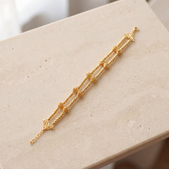 2 Line RP Beads Bracelet (D1) on travertine