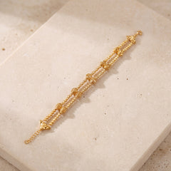 2 Line RP Beads Bracelet (D2) on travertine