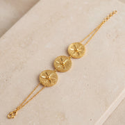 3 Coin Piece Bracelet (D1) on travertine
