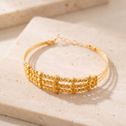 3 Line Kid's Beads Cuff Bracelet (D10) on travertine
