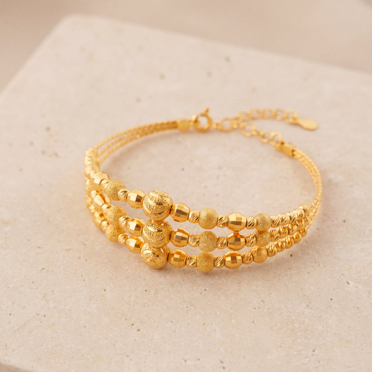 3 Line Kid's Beads Cuff Bracelet (D11) on travertine