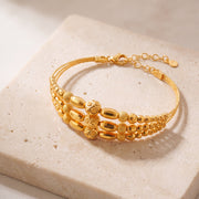 3 Line Kid's Beads Cuff Bracelet (D12) on travertine