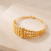 3 Line Kid's Beads Cuff Bracelet (D6) on travertine