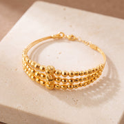 3 Line Kid's Beads Cuff Bracelet (D8) on travertine