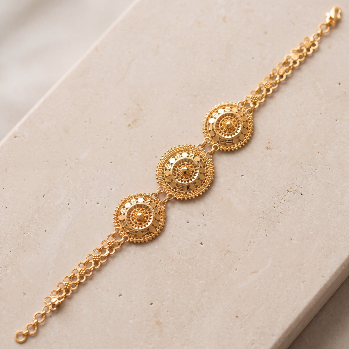 3 Round Piece Bracelet (D1) on travertine