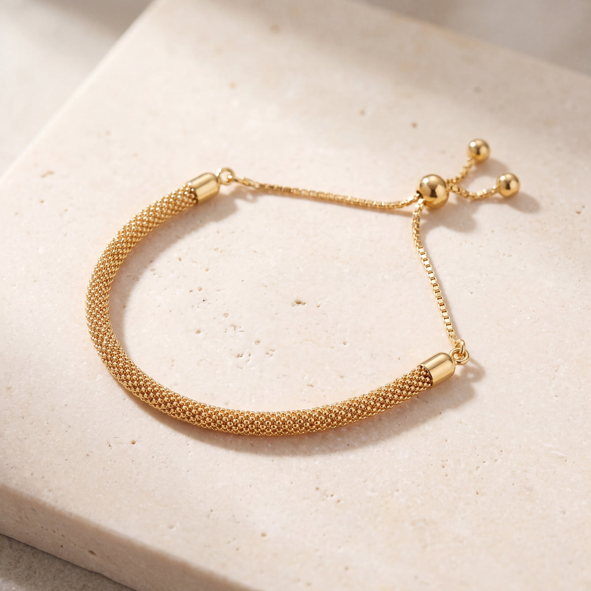 Adjustable Dorika Bracelet on travertine