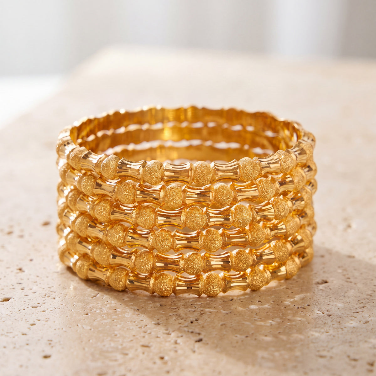 Adult's Bangles (D1-K) on travertine