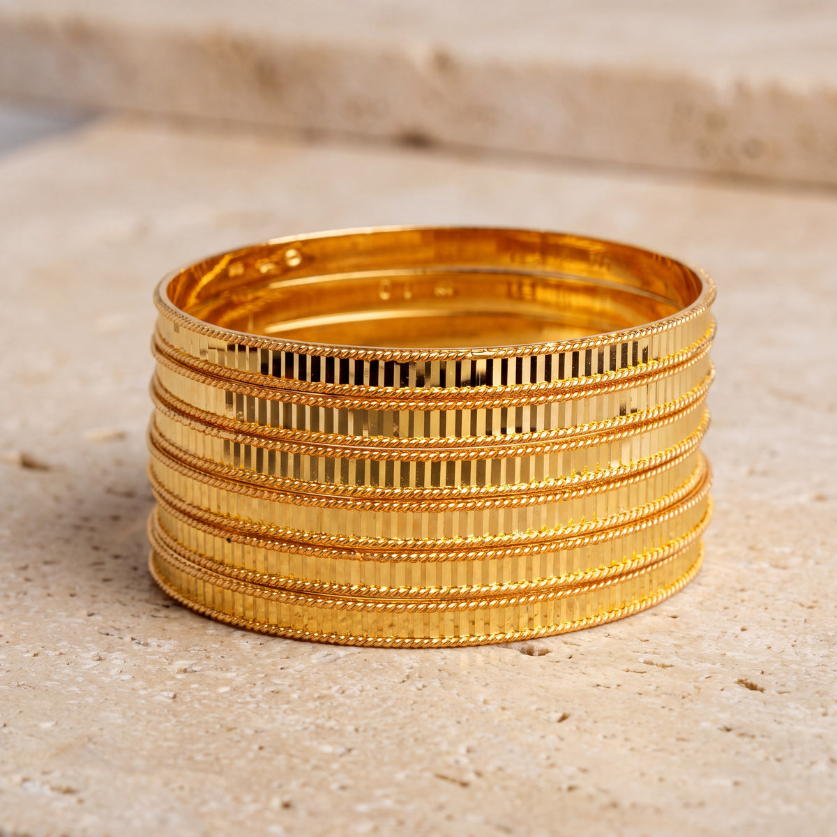 Adult's Bangles (D14-A) on travertine
