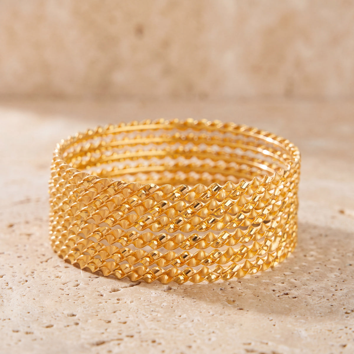 Adult's Bangles (D2-K) on travertine