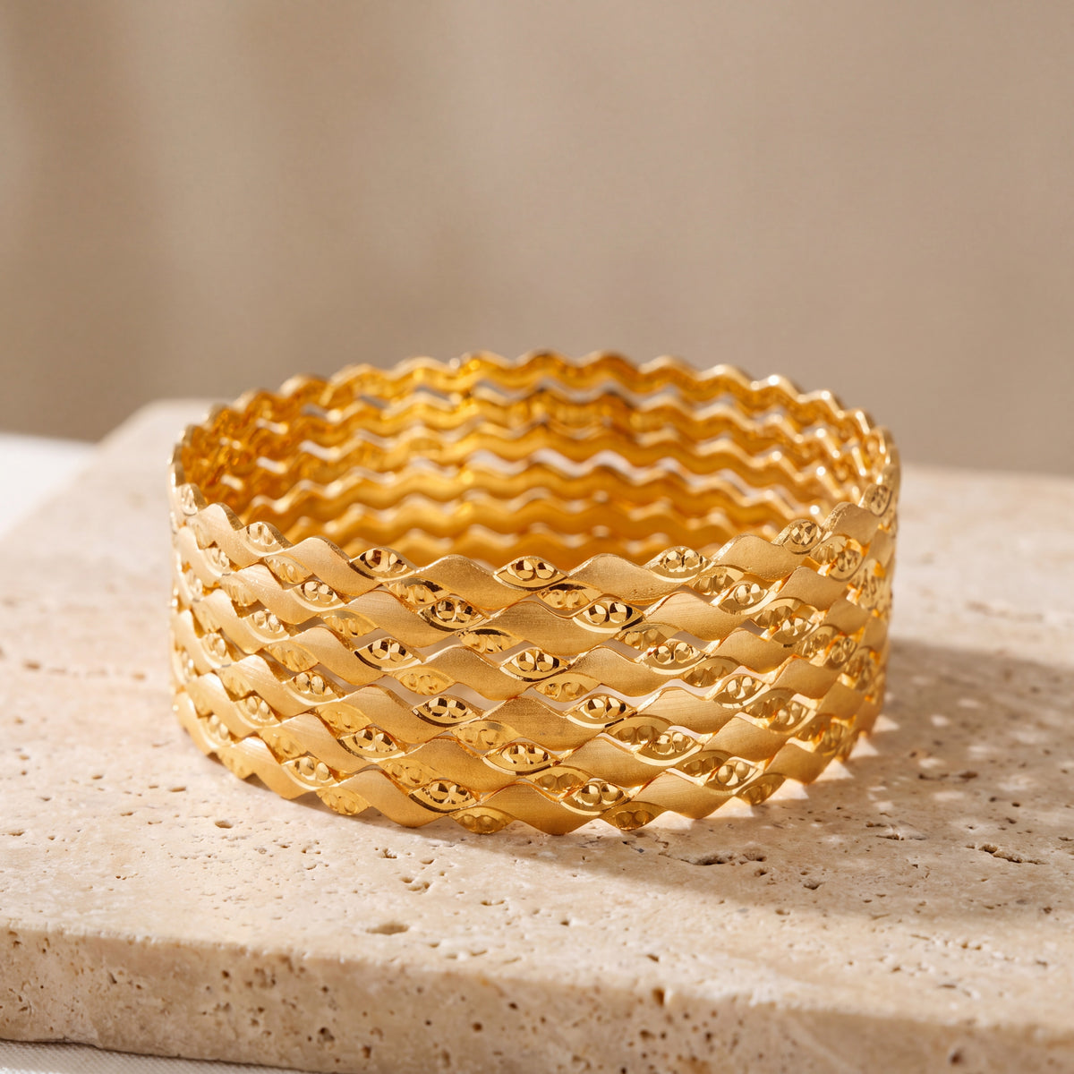 Adult's Bangles (D27-K) on travertine