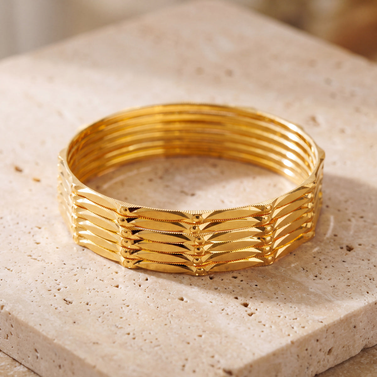 Adult's Bangles (D30-K) on travertine