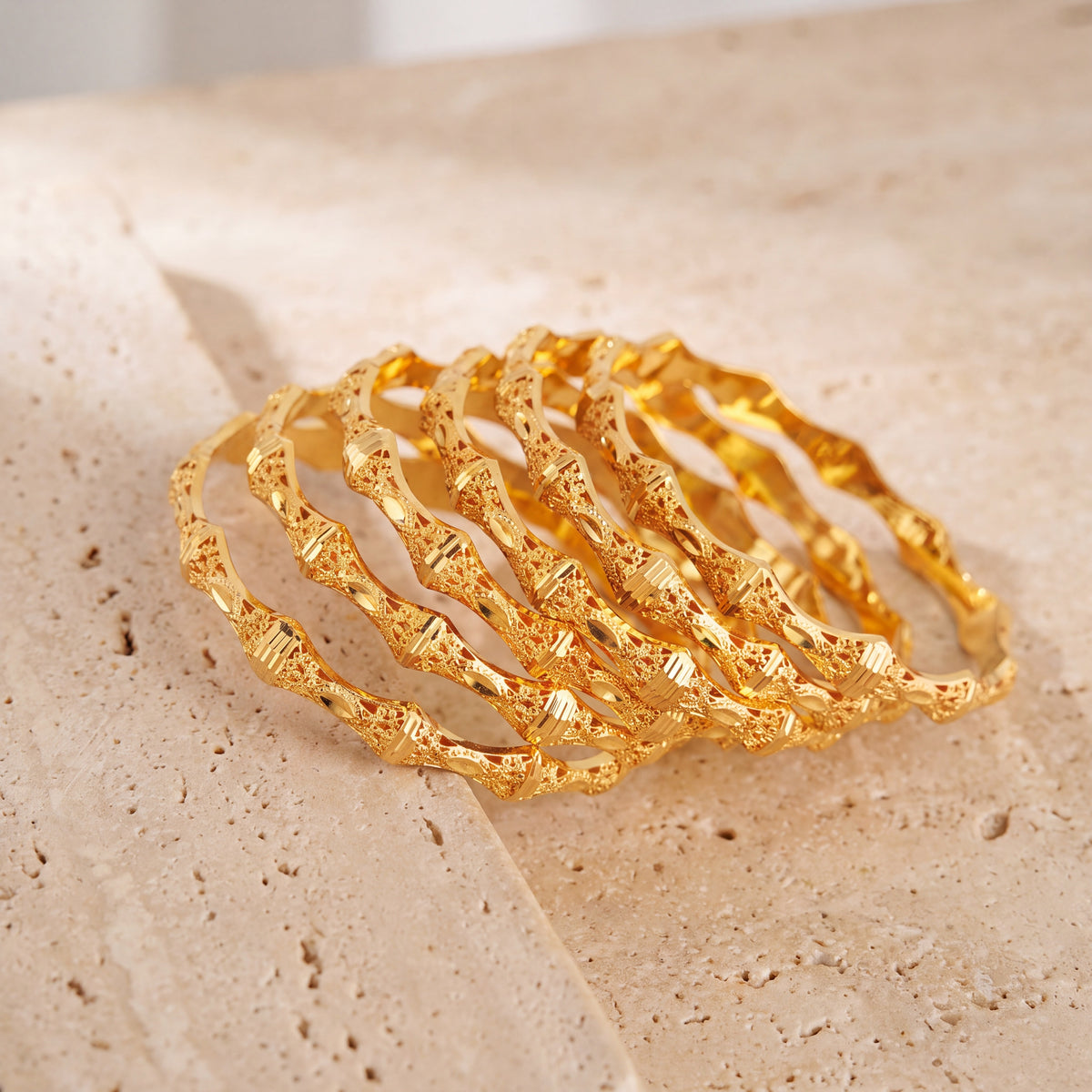 Adult's Bangles (D36-K) on travertine