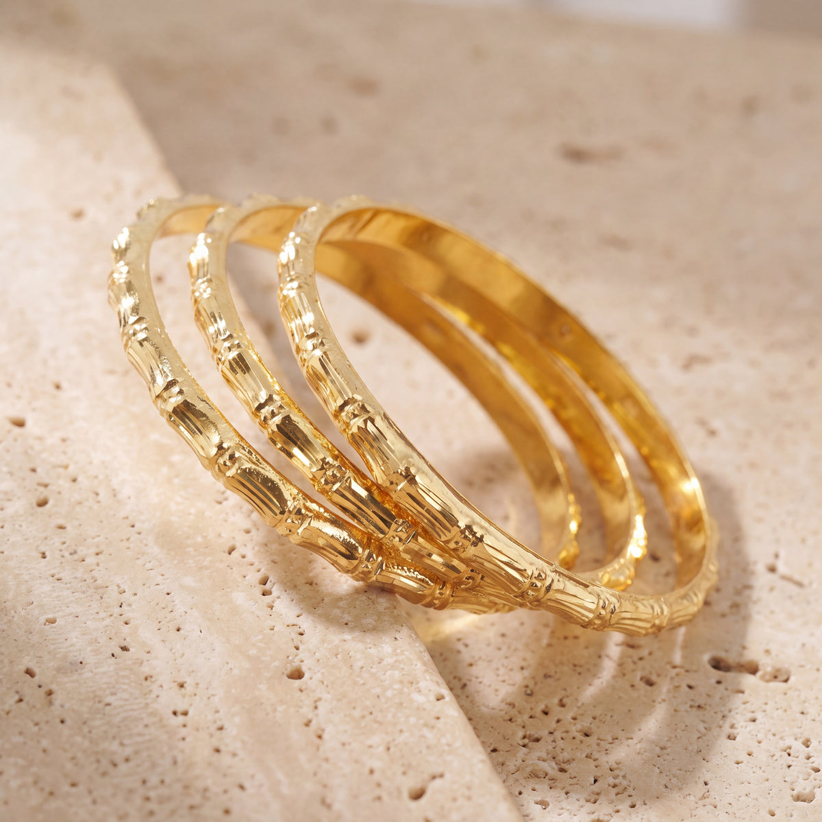 Adult's Bangles (D49-N) on travertine