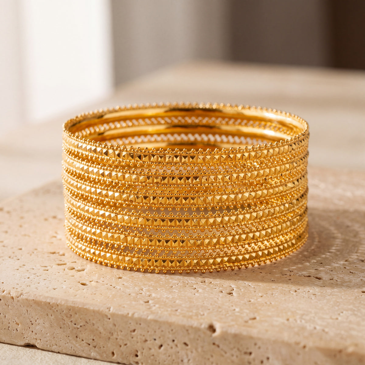 Adult's Bangles (D5-A) on travertine
