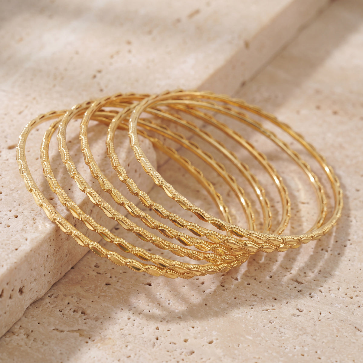 Adult's Bangles (D50-M) on travertine