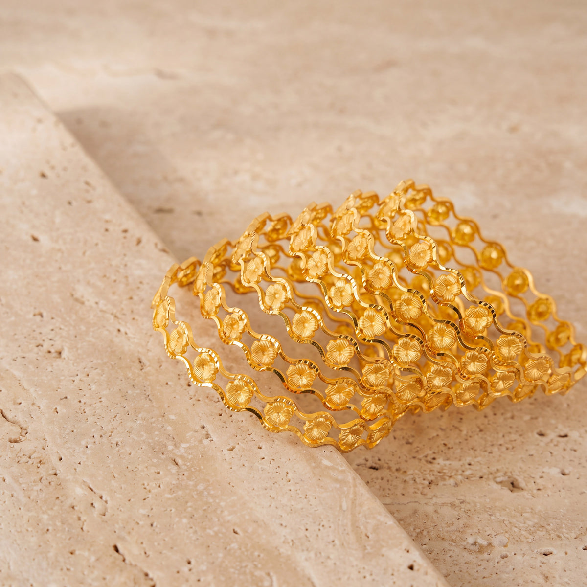 Adult's Bangles (D67-K) on travertine stone