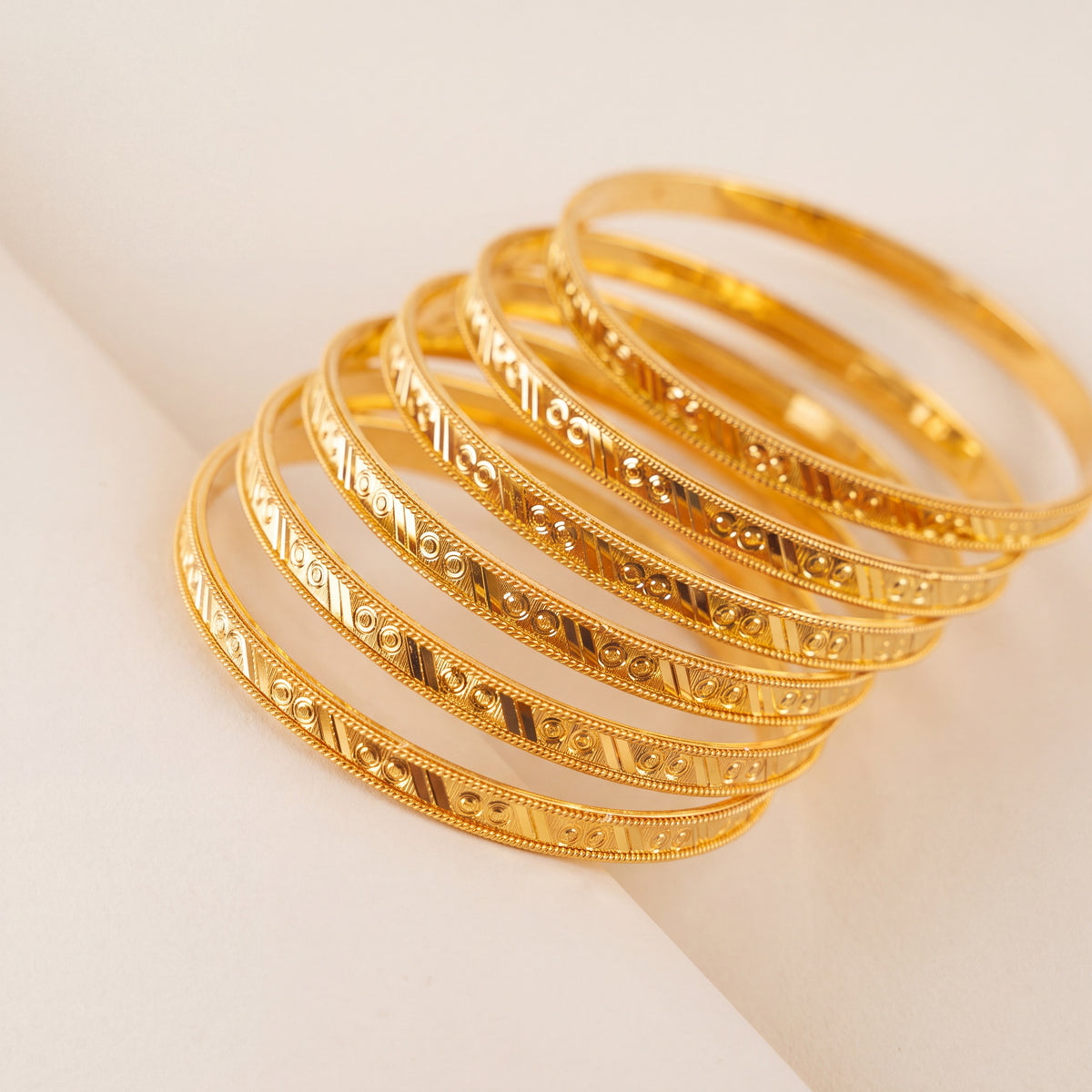 Adult's Bangles (D68-NF) in 925 silver with 24K gold plating, studio photo