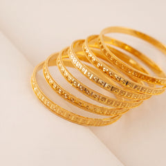 Adult's Bangles (D69-NF) in 925 silver with 24K gold plating, studio photo