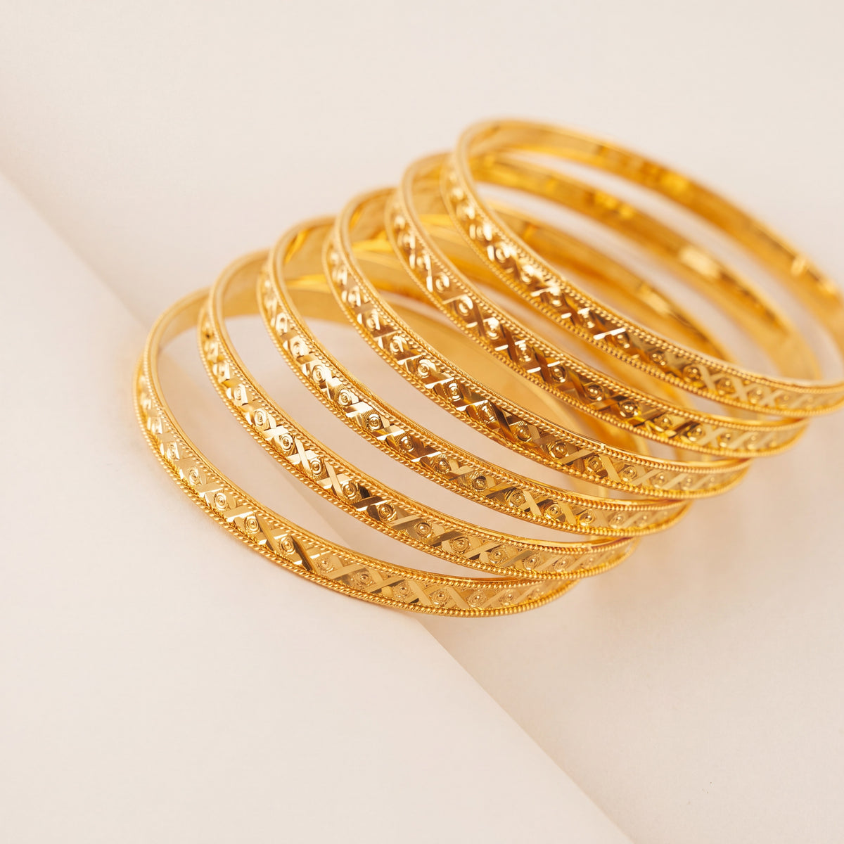 Adult's Bangles (D70-NF) in 925 silver with 24K gold plating, studio photo