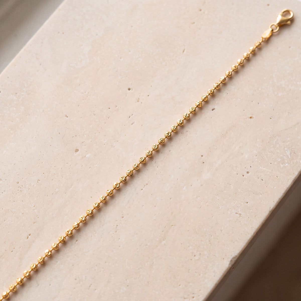 Beads Balls Bracelet (D2) on travertine