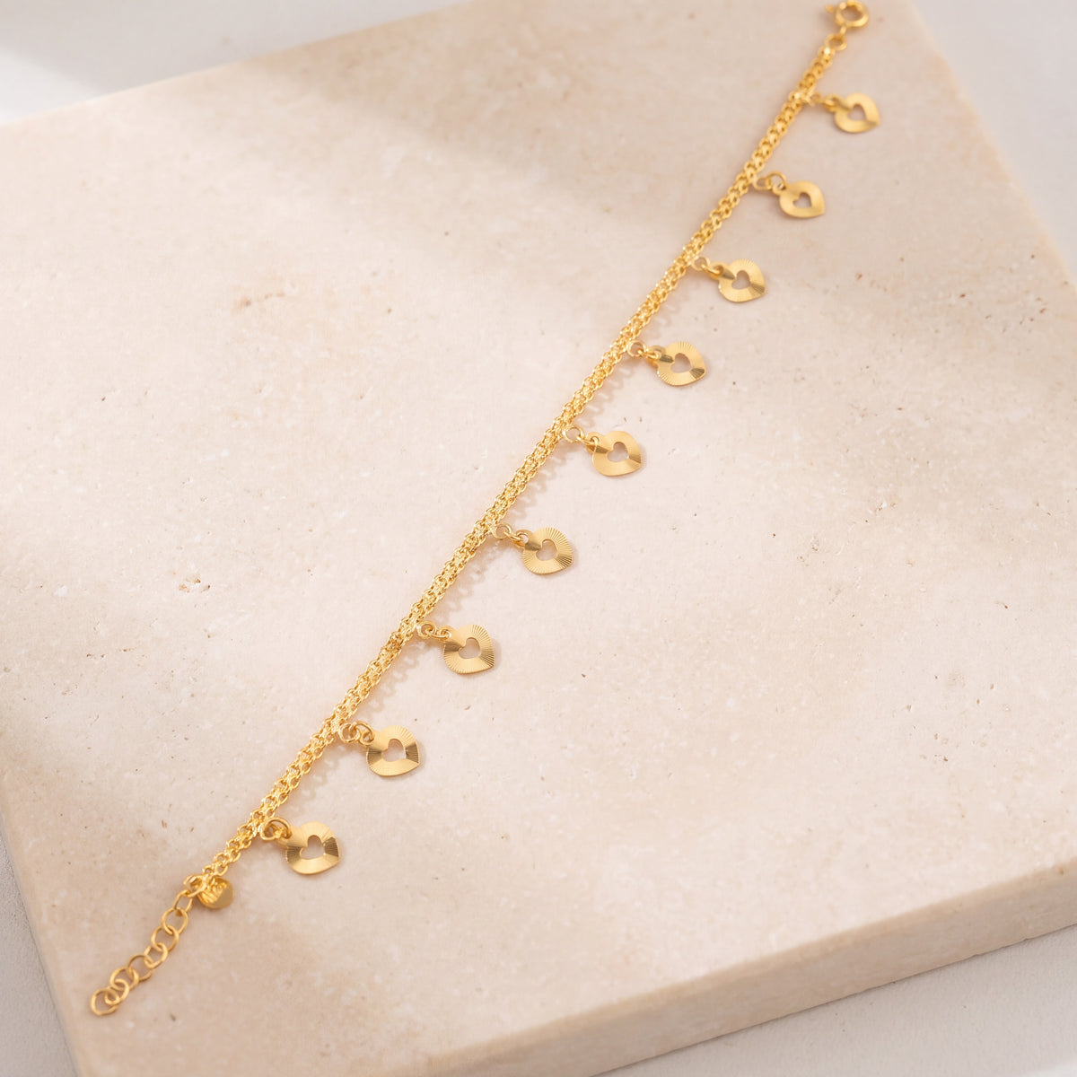 Charm Bracelet (D35) on travertine