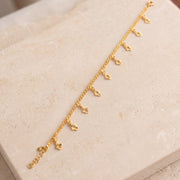 Charm Bracelet (D42) on travertine