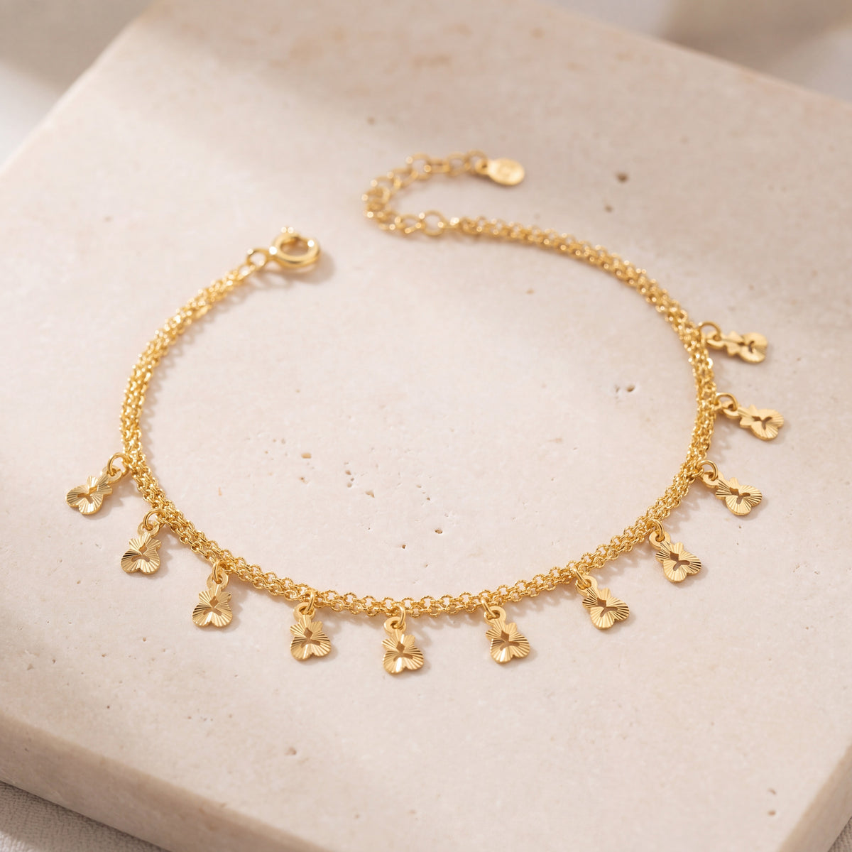 Charm Bracelet (D44) on travertine