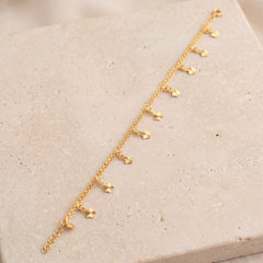 Charm Bracelet (D46) on travertine