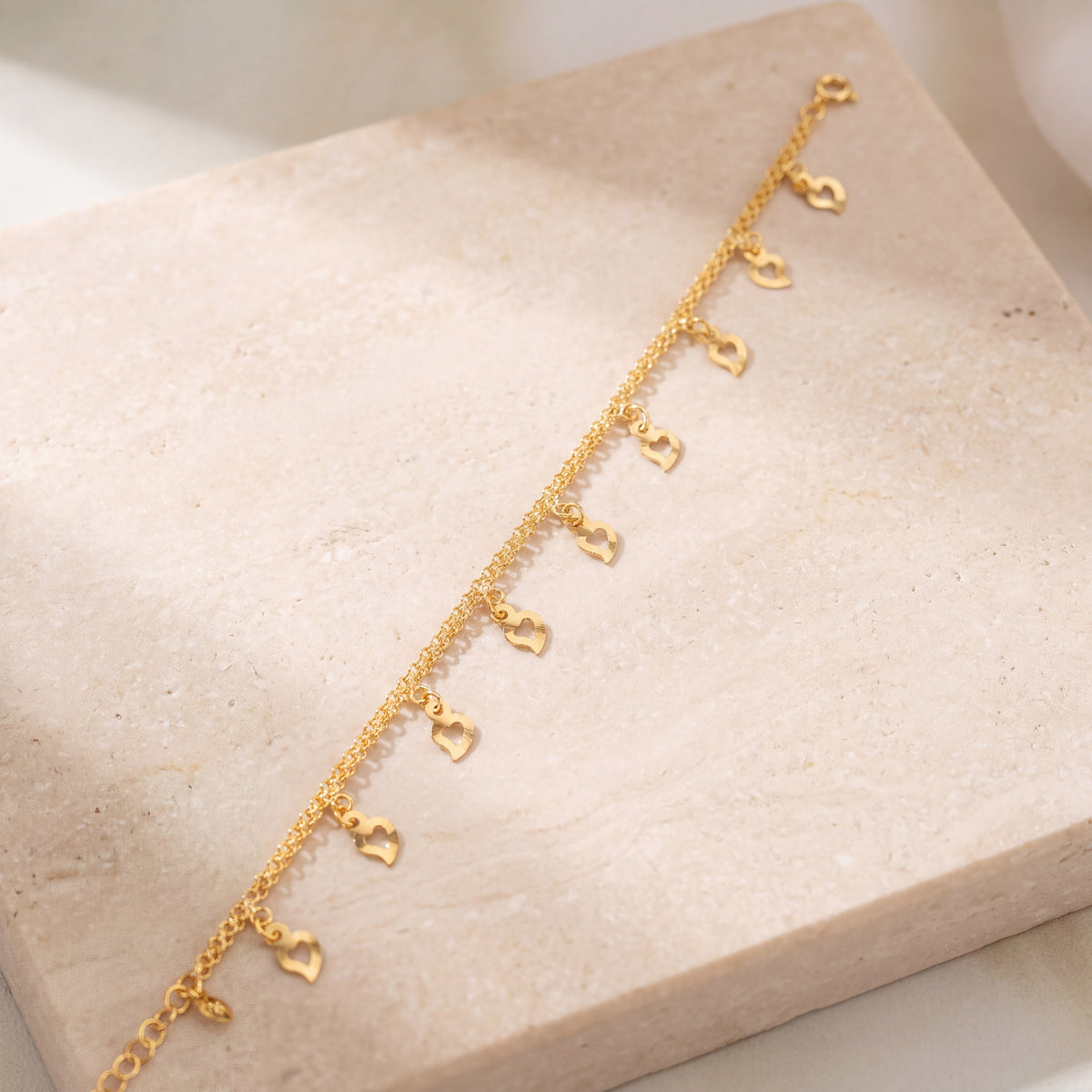 Charm Bracelet (D48) on travertine