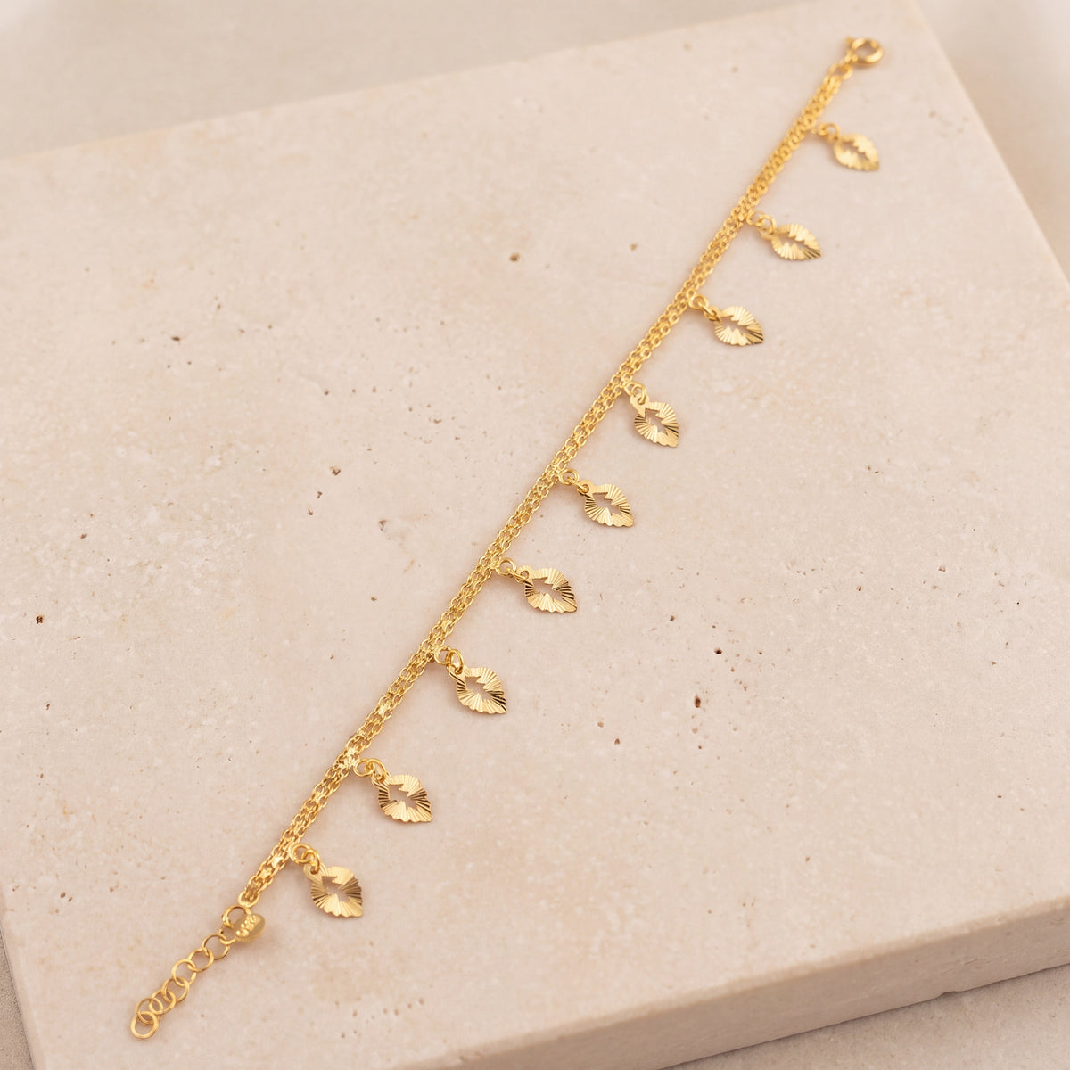 Charm Bracelet (D50) on travertine