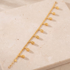 Charm Bracelet (D55) on travertine