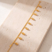Charm Bracelet (D56) on travertine