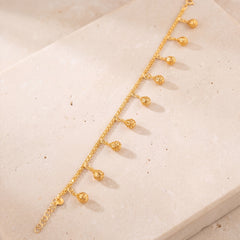 Charm Bracelet (D57) on travertine