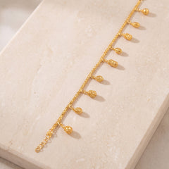 Charm Bracelet (D59) on travertine