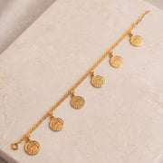 Coin Bracelet (D3) on travertine
