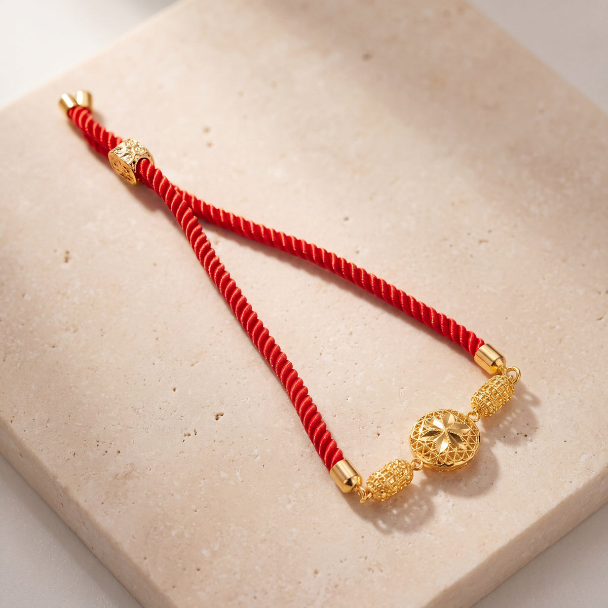Crystal Globe Thread Bracelet on travertine