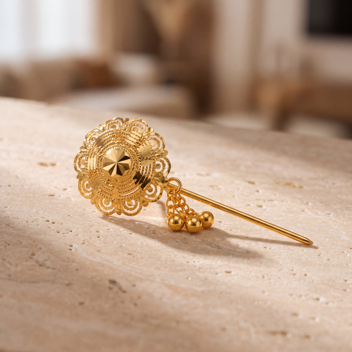 Daboos (D11) scarf pin on travertine stone