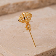 Daboos (D15) scarf pin on travertine stone