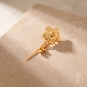 Daboos (D43) scarf pin on travertine stone