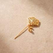Daboos (D47) scarf pin on travertine stone