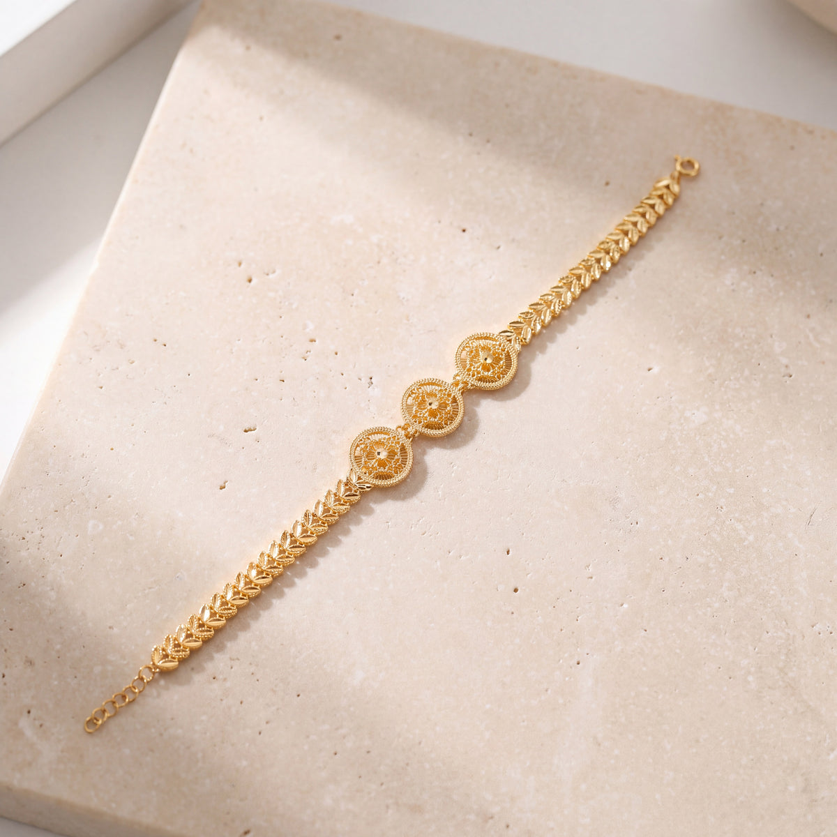 Diamond Cut Circle Bracelet (D2) on travertine