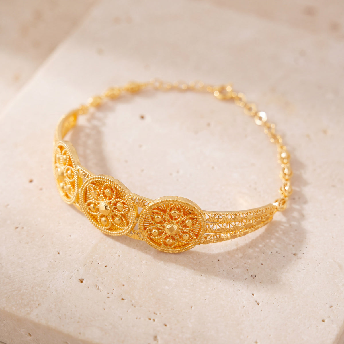 Diamond Cut Circle Cuff Bracelet (D2) on travertine