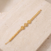 Diamond Cut Clover Bracelet (D1) on travertine