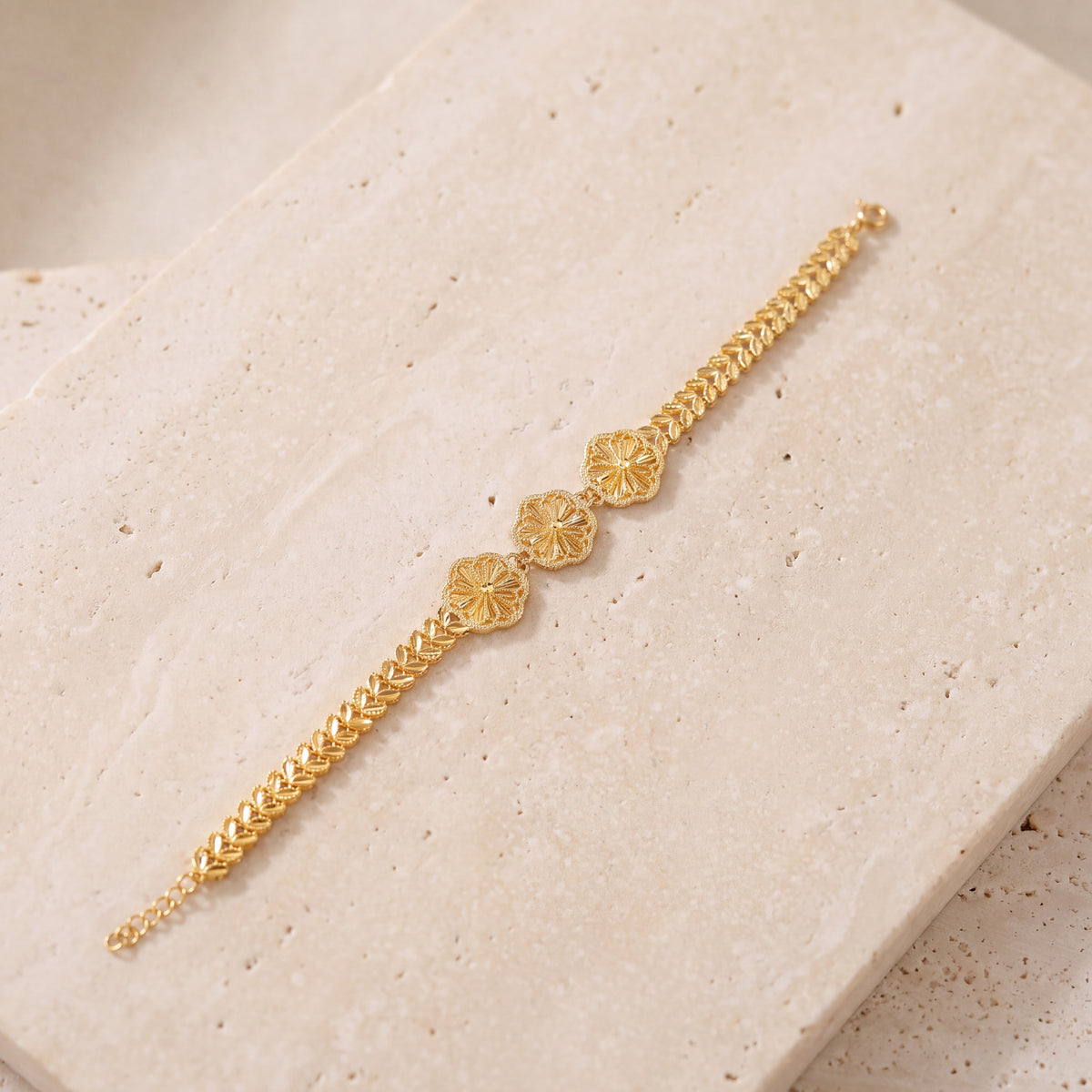 Diamond Cut Clover Bracelet (D1) on travertine