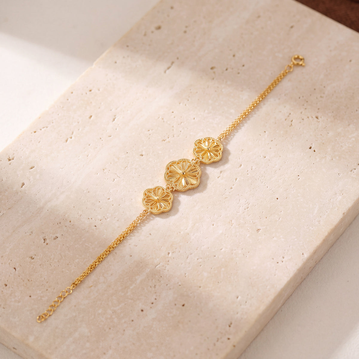 Diamond Cut Clover Bracelet (D2) on travertine