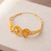 Diamond Cut Drop Cuff Bracelet (D1) on travertine